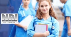 female medical student holding notebooks with a stethoscope around her neck