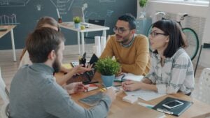 government temp staffing agency team collaborating in modern office environment