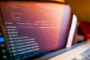 IT jobs DC no experience — code on a computer screen representing cybersecurity and IT support career opportunities in Washington DC