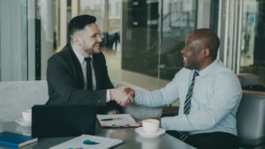 Salary negotiation for new grads — sealing a job offer with a handshake